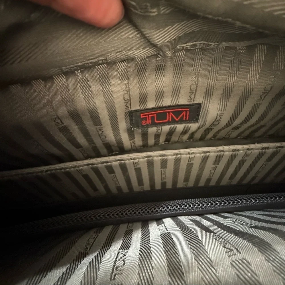 Tumi black leather